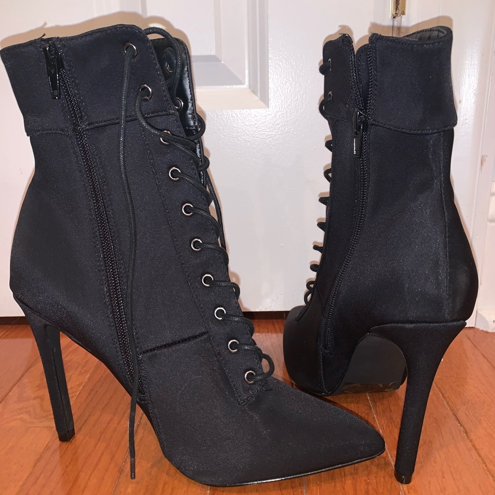 Pointed lace up booties